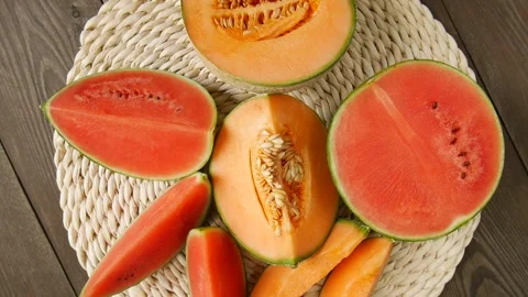 Cut melon watermelon on the table. Stock Footage 302473076