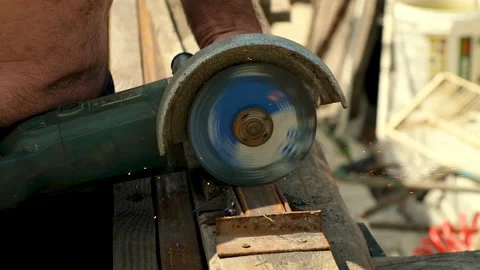 Cut metal with a grinder. Selective focus. Stock Footage 155874225