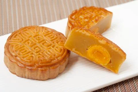 Cut Moon Cake on a Modern Rectangular Plate Stock Photos