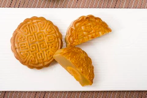 Cut Moon Cake on a Modern Rectangular Plate Stock Photos