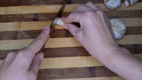 Cut Mushrooms With Knife Stock Footage 165542591