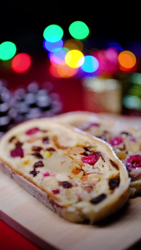 Cut open German Stollen cake, Vertical video for smartphone footage Stock Footage 259857256