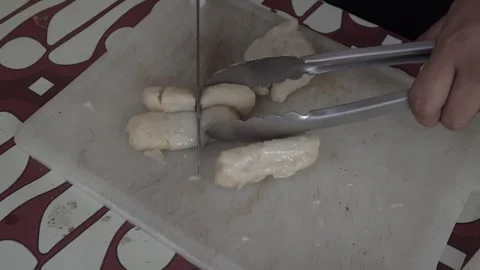 Cut or slice pempek Stock Footage 265934415