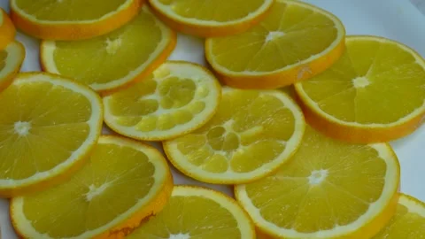Cut up oranges rotate.C0381 Stock Footage 255573920