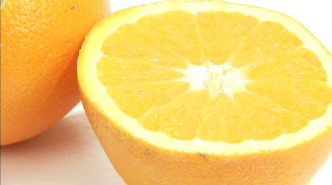 Cut oranges spinning close up5 Video stock 631271