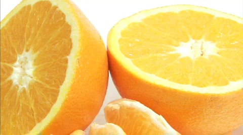Cut oranges spinning close up5 Stock Footage 631306