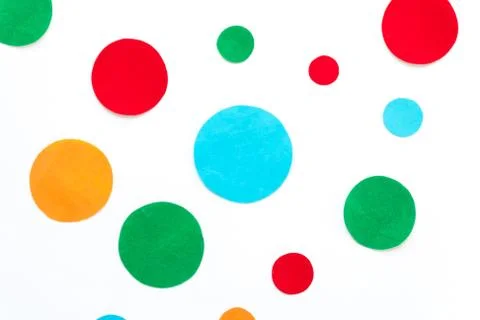 Cut out different colored circles on white background Stock Illustration