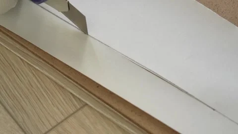 Cut paper with a knife Stock Footage 265163615