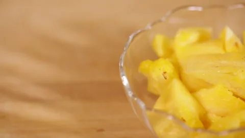 Cut pineapple into pieces with pineapple pulp (3) Stock Footage 202155608