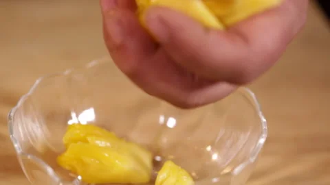 Cut pineapple into pieces with pineapple pulp (5) Stock Footage 202155692