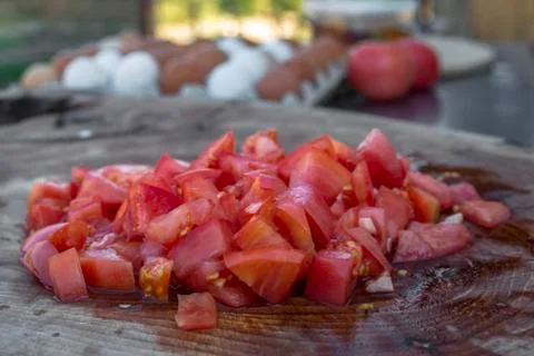 Cut pink tomatoes. Stock Photos
