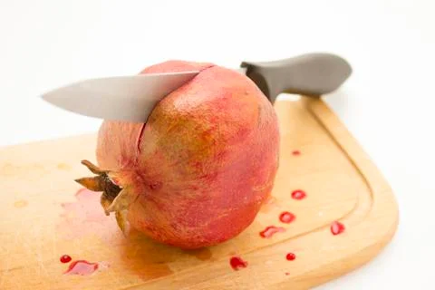 Cut pomegranate Stock Photos