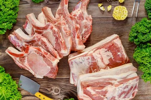 Cut pork meat chop bone in and pork belly. Stock Photos
