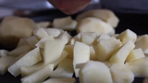 Cut potato cubes  Stock Footage 77693914