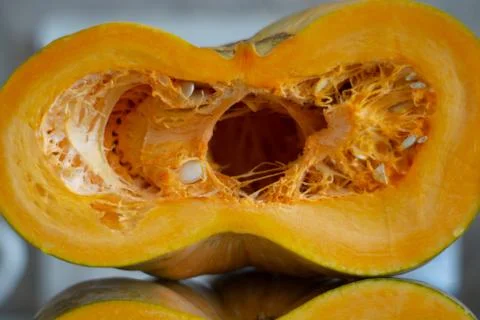 Cut pumpkin on the table Stock Photos