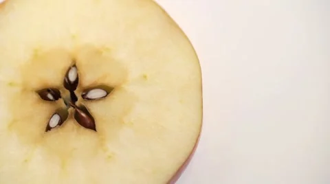 Cut red apple isolated rotation on white backround Stock-Footage 61776520