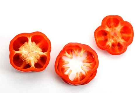 Cut red bell pepper Stock Photos