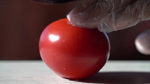 Cut Red Tomato in the morning backlight. Stock Footage 134446375