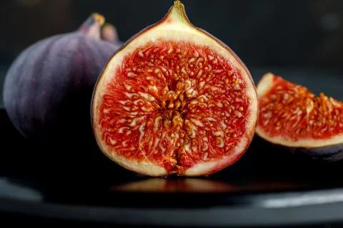 Cut ripe figs Stock Photos