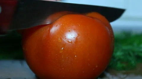 Cut a ripe tomato Stock Footage 61344014