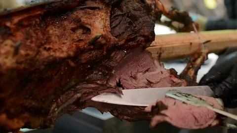 Cut Roasted meat. Cook cuts grilled meat to prepare dishes Stock Footage 78767492