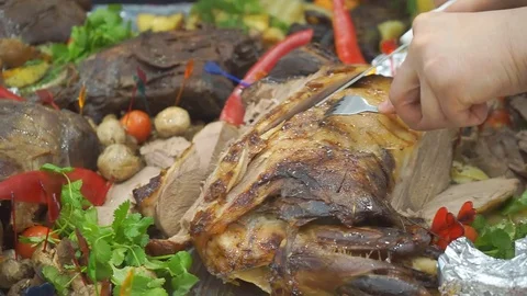Cut Roasted meat for the Holiday Table Stock Footage 72669696