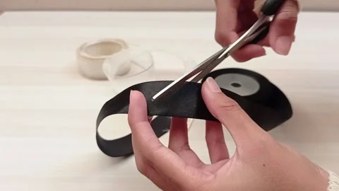 Cut the rope using scissors Stock Footage 139429849