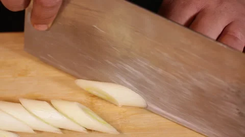 Cut scallions with a kitchen knife and cutting board Video stock 202156802