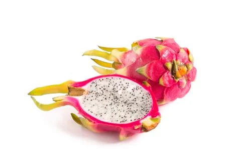 Cut section of dragon fruit and a whole one Foto stock