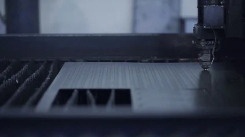 Cut sheet metal at workshop. Modern tool in heavy industry. Dangerous job. High Stock Footage 72544292