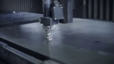 Cut sheet metal at workshop. Modern tool in heavy industry. Dangerous job. High Stock Footage 72544625