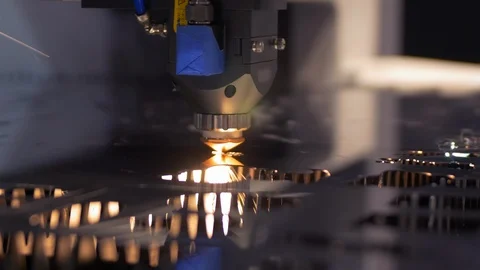 Cut sheet metal at workshop. Modern tool in heavy industry. Dangerous job. High Stock Footage 107949206