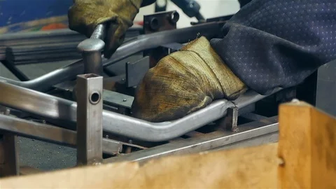 Cut sheet metal at workshop. Modern tool in heavy industry. Dangerous job. High Stock Footage 127735511