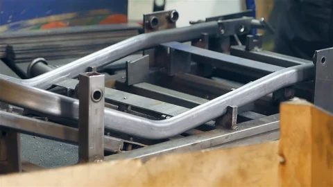 Cut sheet metal at workshop. Modern tool in heavy industry. Dangerous job. High Stock Footage 127735839