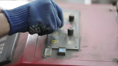 Cut sheet metal at workshop. Modern tool in heavy industry. Dangerous job. High Stock Footage 142884675