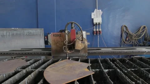 Cut sheet metal at workshop. Modern tool in heavy industry. Dangerous job. High Stock Footage 142886776