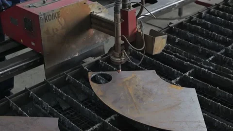 Cut sheet metal at workshop. Modern tool in heavy industry. Dangerous job. High Stock Footage 142902483