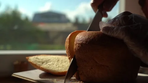 Cut a slice of brea Stock Footage 134462621