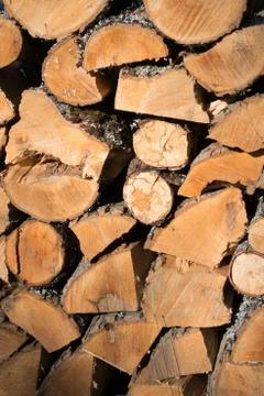 Cut split stacked firewood for winter background close-up Stock Photos