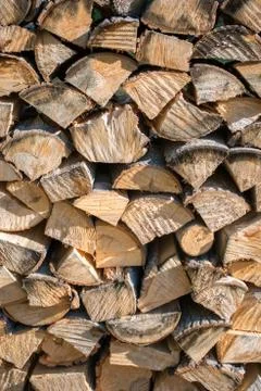 Cut split stacked firewood for winter background close-up Stock Photos