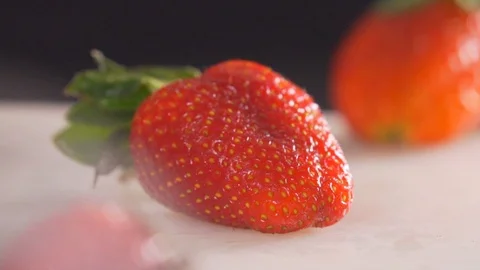 Cut strawberries, put on a dessert Stock Footage 116684500