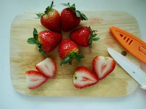Cut strawberry Stock Photos