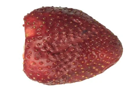 Cut strawberry slice surface close up macro isolated Foto stock
