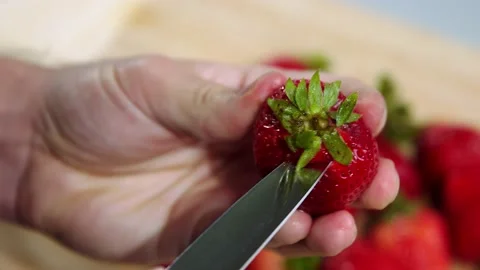 Cut the Strawberry slow motion Stock Footage 221567704