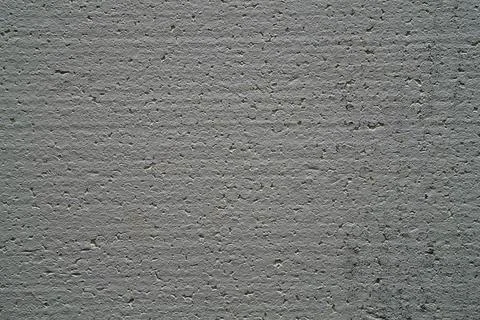 Cut surface of dark white foam sheet painted with water-based paint, the text 스톡 사진