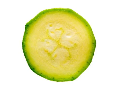 Cut a thin slice of zucchini, isolated on white background Stock Photos