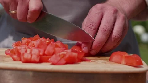Cut the tomato with a close-up knife Stock Footage 228780065