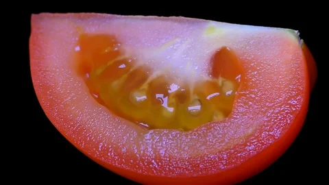 Cut Tomato Isolated on Black Background Stock Footage 91094852