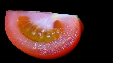 Cut Tomato Isolated on Black Background Stock Footage 91094858