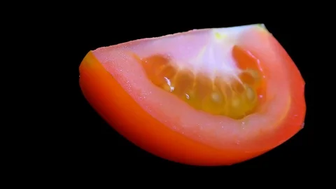 Cut Tomato Isolated on Black Background Stock Footage 91094883